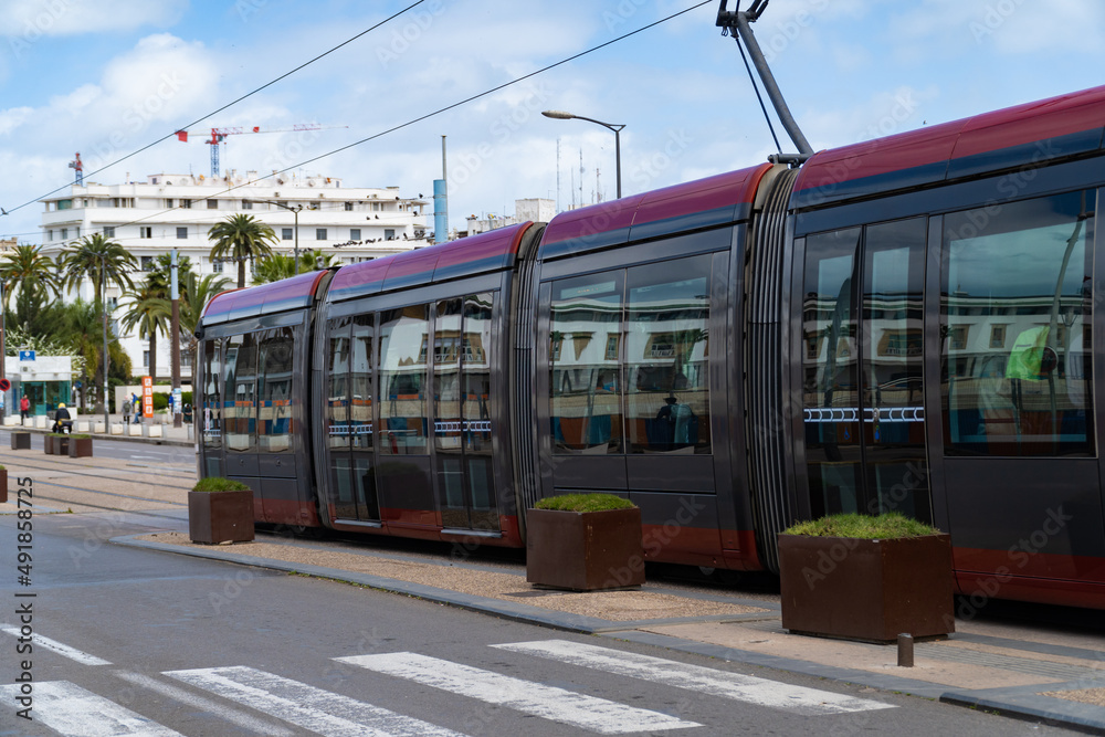 Naklejka premium a tram passing in old medina near Mohammed V Square Casablanca, Morocco