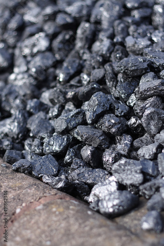 Coal in storage outdoors close up