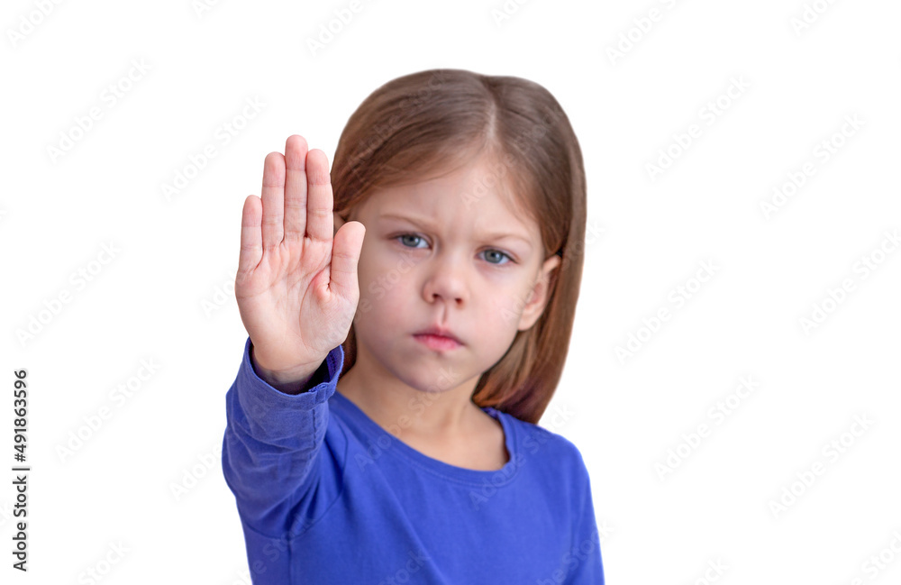 Child showing hand as sign to stop focus on palm Child showing hand as sign to stop focus on palm
