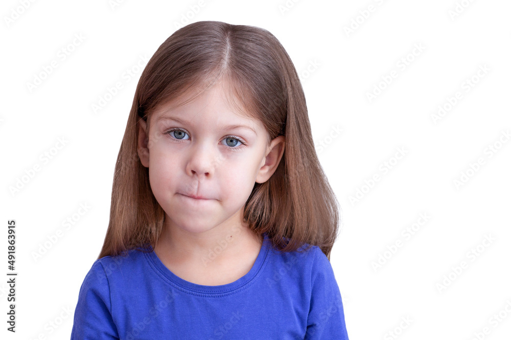 Child pursed lips looking at camera Child pursed lips looking at camera