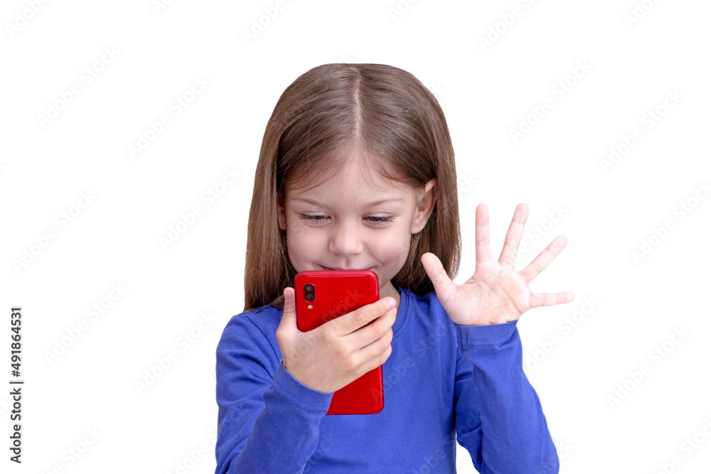 Smiling child looking at mobile phone and waving to screen, isolated on white background waist up caucasian little girl of 5 years in blue Smiling child looking at mobile phone and waving to screen, isolated on white background waist up caucasian little girl of 5 years in blue