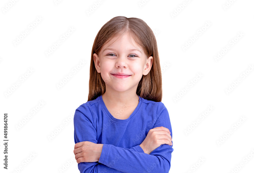 Smiling child crossed arms on breast, isolated on white background looking at camera waist up caucasian little girl of 5 years in blue Smiling child crossed arms on breast, isolated on white background looking at camera waist up caucasian little girl of 5 years in blue
