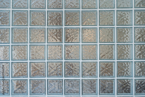 Glass block wall closeup for background, Transparent brick glass wall