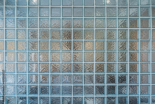 Glass block wall closeup for background, Transparent brick glass wall photo