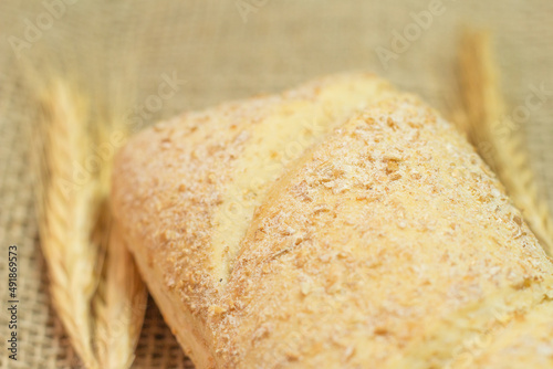 superclose of  bread on a straw table photo