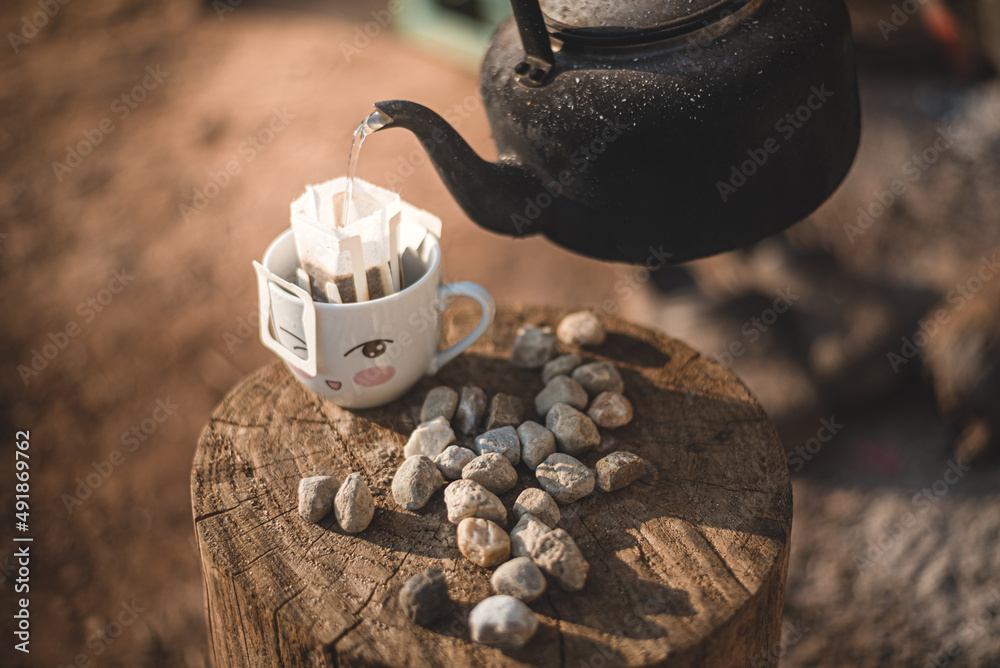 Old Coffee Pot In Camping Site Used In Open Fire Stock Photo