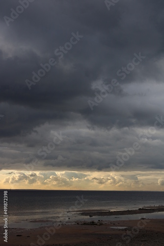 clouds over the beach