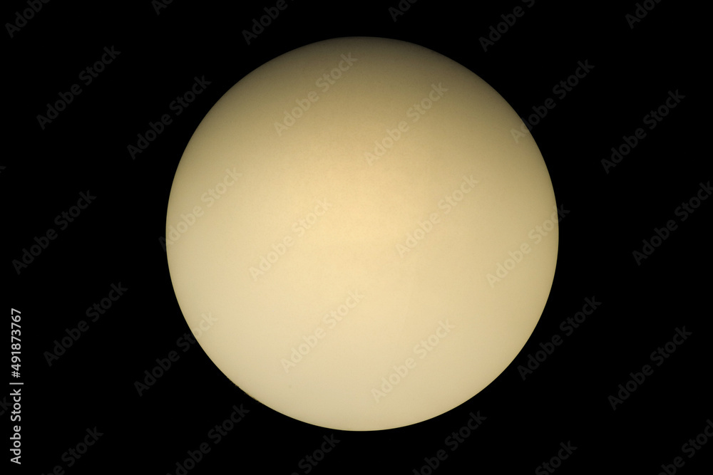 Closeup lightening lamp isolated on the black background. Full moon in the dark night