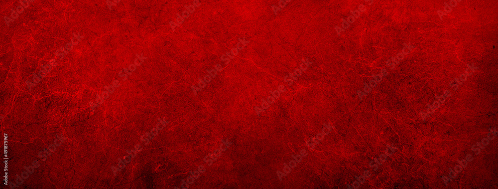 Grunge dark royal red color abstract paper or marbled granite stone rock wall texture background with grain distressed design pattern in textured panorama banner header