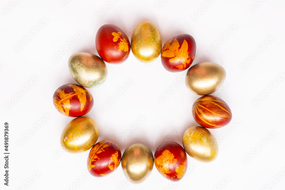 Golden eggs on a white background . Easter Concept Golden eggs on a white background . Easter Concept