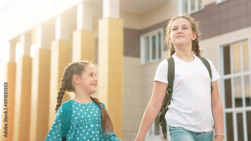 back to school. kids a walk to school for lifestyle lesson. education training support concept. child walk to school with a backpack. kids rush to school. family day. group kids with backpacks back to school. kids a walk to school for lifestyle lesson. education training support concept. child walk to school with a backpack. kids rush to school. family day. group kids with backpacks