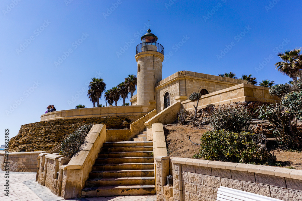 view of the Roquetas de Mar lighthouse on the coast of Andalusia
