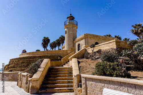 view of the Roquetas de Mar lighthouse on the coast of Andalusia photo