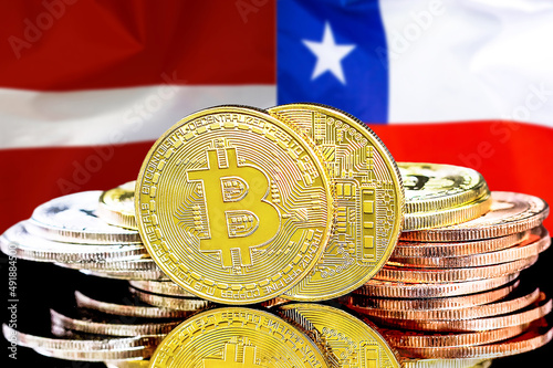 Bitcoins on the background of flag Latvia and Chile. Concept for investors in cryptocurrency and Blockchain technology in Latvia and Chile