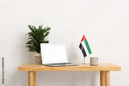 Laptop with blank screen, U...