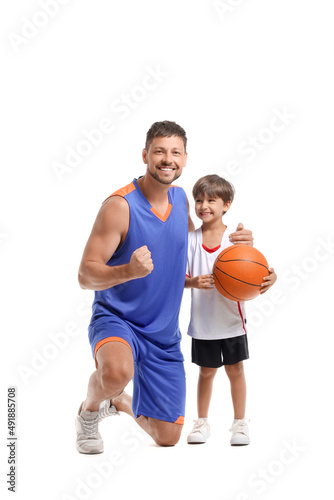 Little boy with ball and his trainer on white background