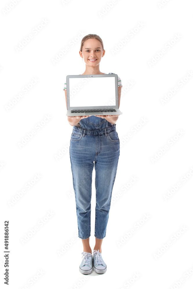 Young woman holding laptop with blank screen on white background