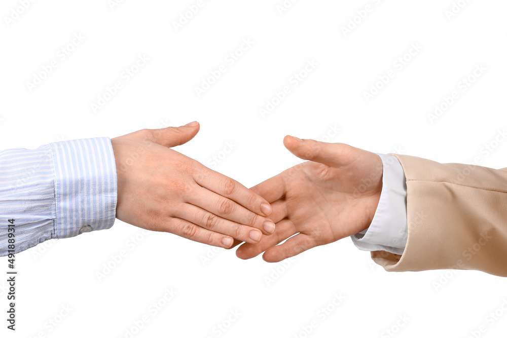 Business woman shaking her colleague's hand on white background Business woman shaking her colleague's hand on white background