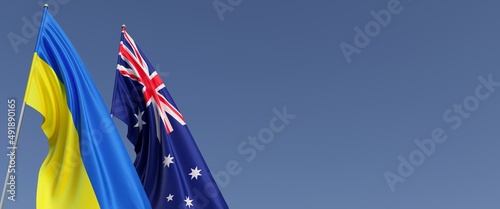 Flags of Australia and Ukraine on flagpoles on side. Flags on blue background. Place for text. Independent, sovereign Ukraine. Australian flag. Commonwealth. 3D illustration.