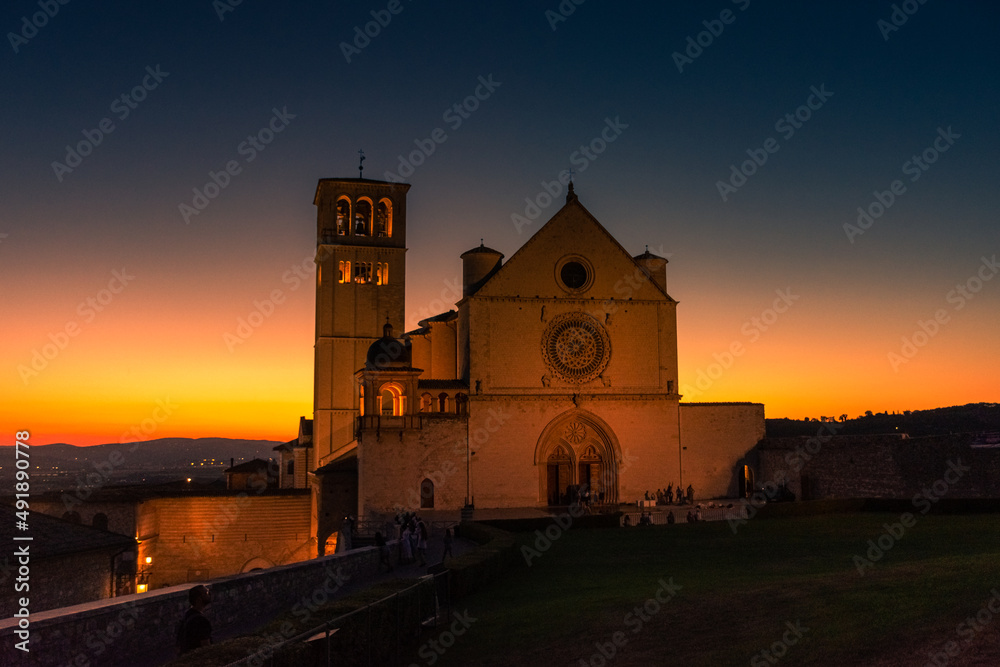 ASSISI, ITALY, 6 AUGUST 2021 Stunning sunset over the San Francesco Basilica, one of the most important catholic churches
