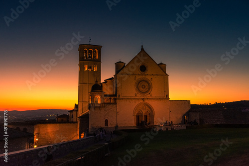 ASSISI, ITALY, 6 AUGUST 2021 Stunning sunset over the San Francesco Basilica, one of the most important catholic churches