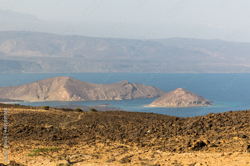 Coast of Ghoubbet-el-Kharab (Lake Ghoubbet) cove in Djibouti Coast of Ghoubbet-el-Kharab (Lake Ghoubbet) cove in Djibouti