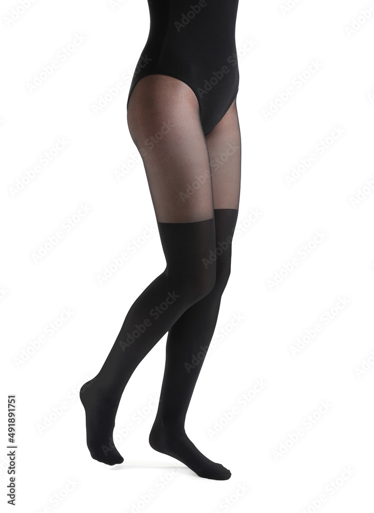 Beautiful young woman in black tights isolated on white Beautiful young woman in black tights isolated on white