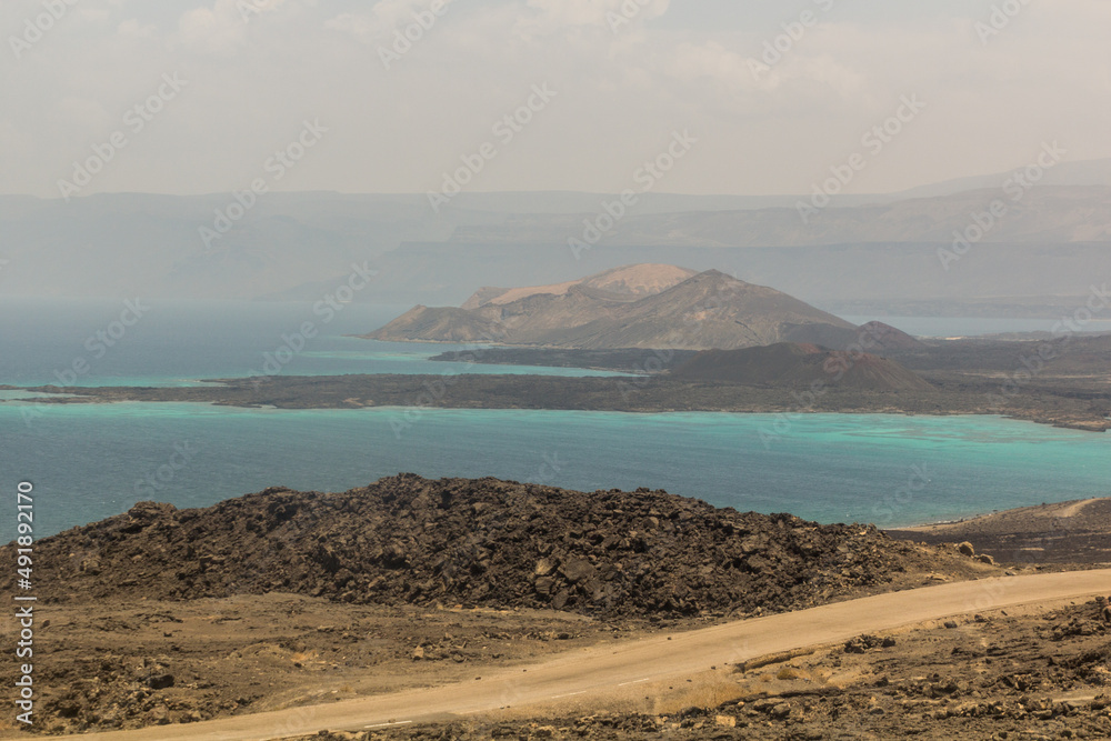 Coast of Ghoubbet-el-Kharab (Lake Ghoubbet) cove in Djibouti Coast of Ghoubbet-el-Kharab (Lake Ghoubbet) cove in Djibouti