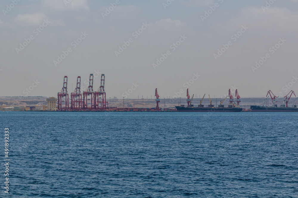 Ships and cranes in the port of Djibouti, capital of Djibouti.