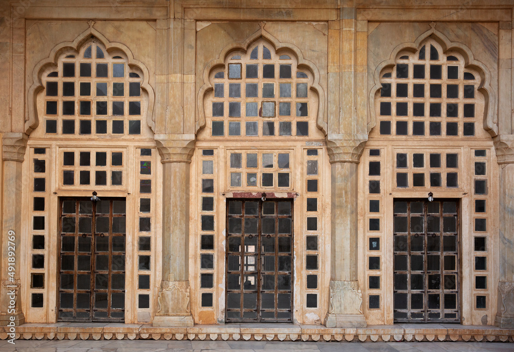 Glass doors and windows near Sheesh Mahal of  ancient Amer fort of Jaipur, India
