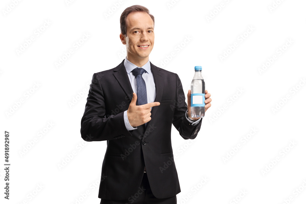 Professional man in suit and tie holding a bottle of water and pointing Professional man in suit and tie holding a bottle of water and pointing
