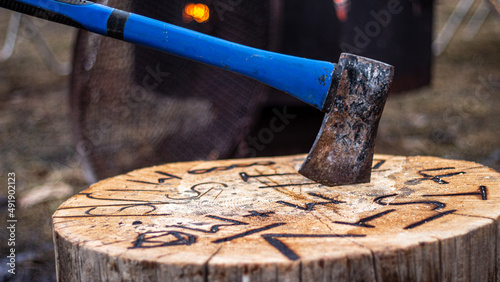 axe in a log photo