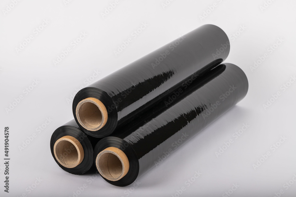 Roll of plastic cling film with black wrap. how long the roll of cling