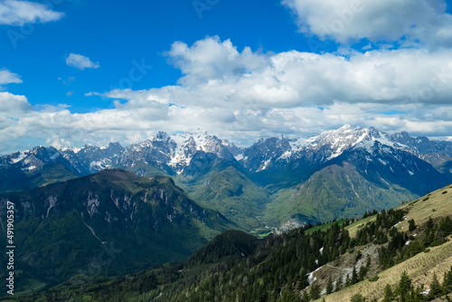 Panoramic view in spring from Frauenkogel on mount Mangart in the Julian Alps, Friuli, Italy. Border Austria, Italy, Slovenia. Triglav National Park. Upper Drava valley. Summit © Chris