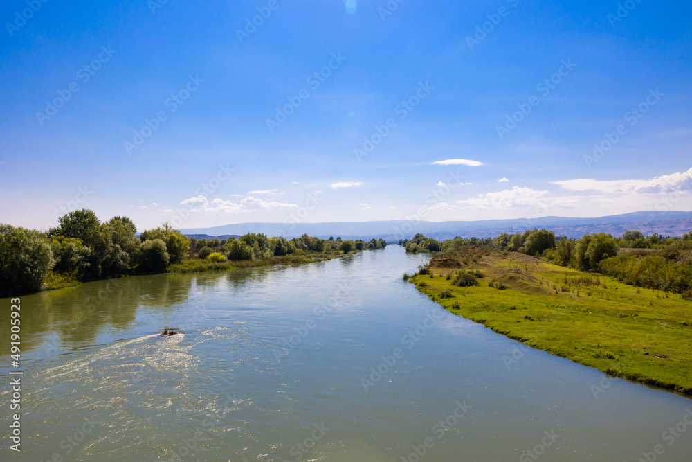 River view. A river on the plain from aerial view. Water pollution concept photo