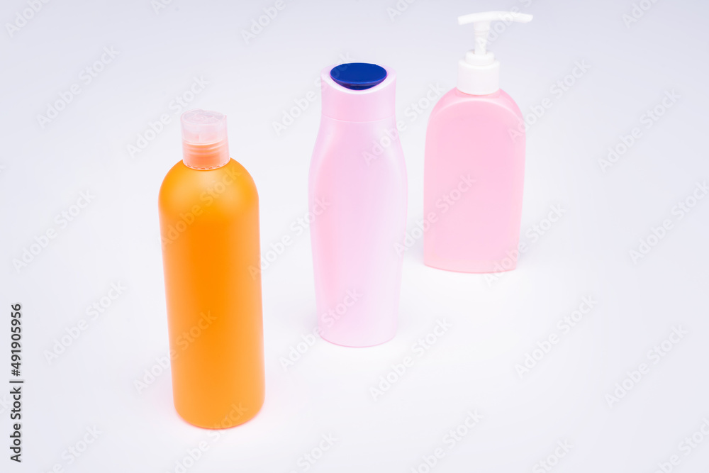 Easy to use. Toiletry bottles. Refillable bottles isolated on white. Beauty products packaging Easy to use. Toiletry bottles. Refillable bottles isolated on white. Beauty products packaging