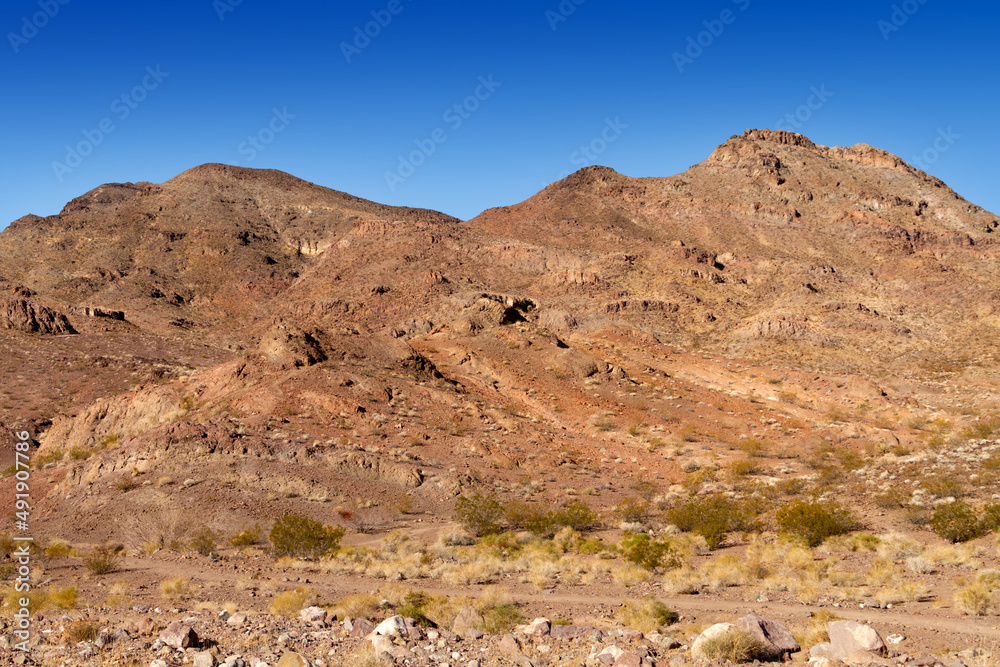 Southern Nevada desert mountain range with blue sky