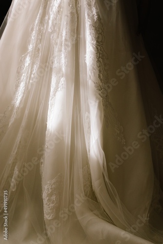 Close up of the skirt of a wedding dress