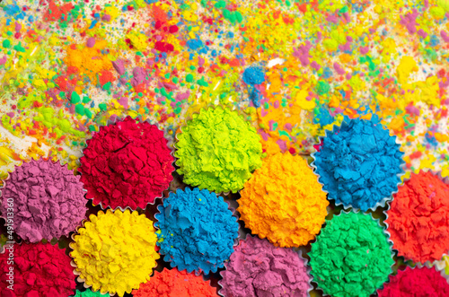 Happy Holi  A colorful festival of colored paints made from powder and dust. Colorful holi powder background. Holiday of bright colors Indian tradition.