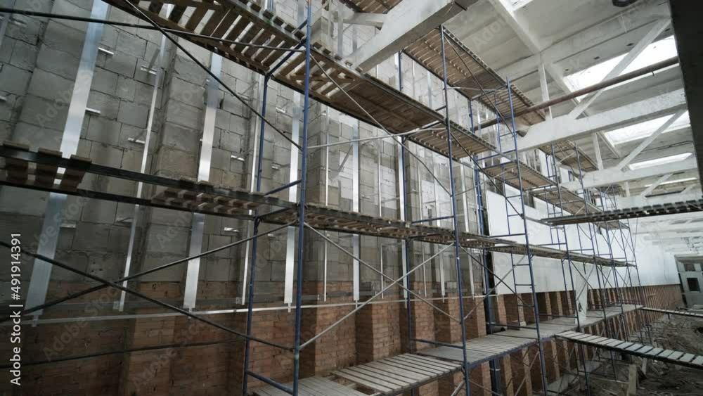 Construction of a building using scaffolding Construction of a building using scaffolding