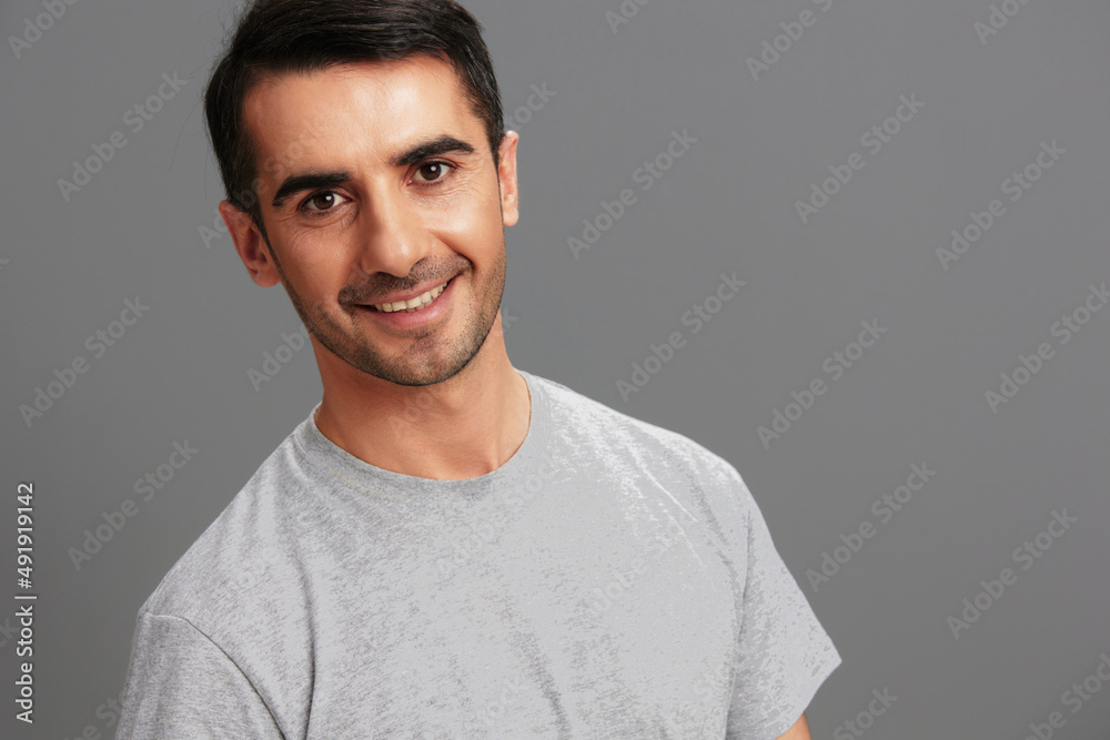 handsome man posing lifestyle smile studio cropped view handsome man posing lifestyle smile studio cropped view