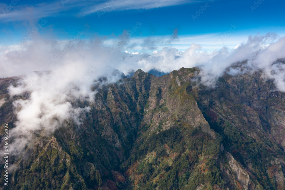 View into the valley of nuns in Madeira, Portugal. Mountains with dramatic clouds. 