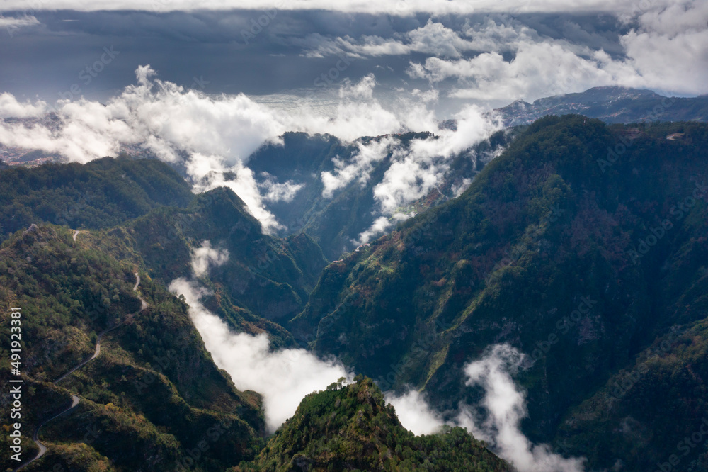 View into the valley of nuns in Madeira, Portugal. Mountains with dramatic clouds. 