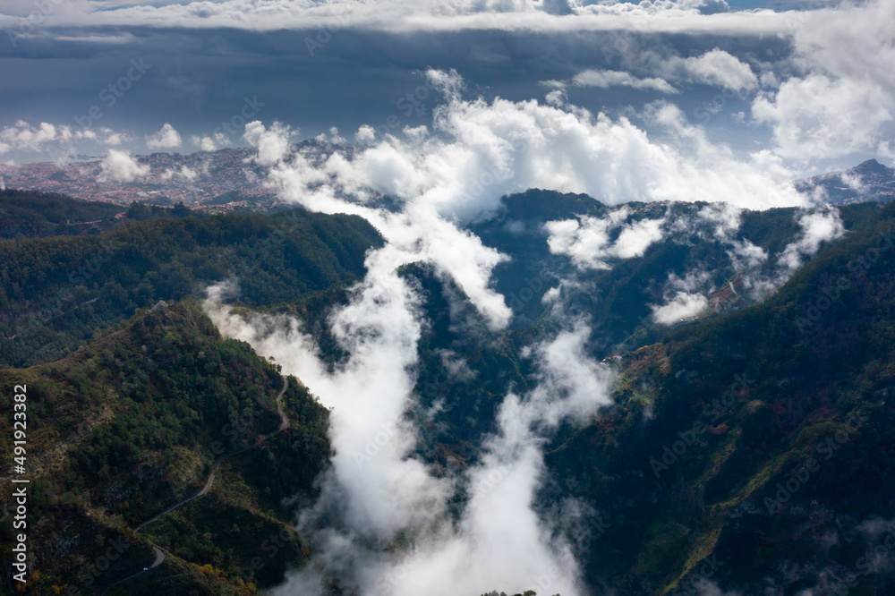 View into the valley of nuns in Madeira, Portugal. Mountains with dramatic clouds. 