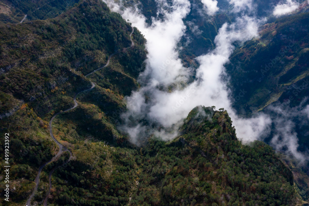 View into the valley of nuns in Madeira, Portugal. Mountains with dramatic clouds. 