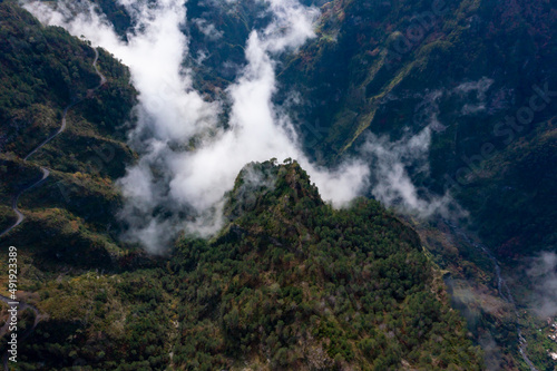 View into the valley of nuns in Madeira, Portugal. Mountains with dramatic clouds. 