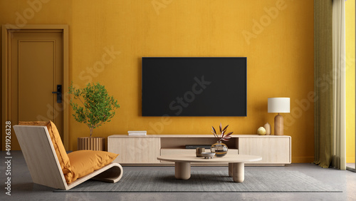 Yellow living room interior with armchair,TV stand and plant.3d rendering © manow