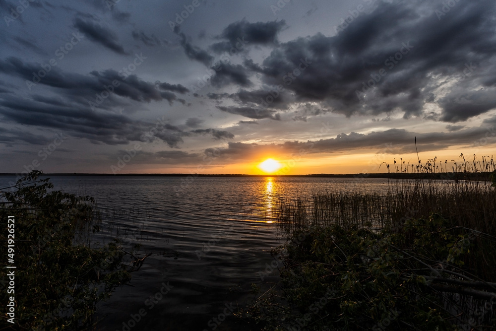 Incredibly beautiful sunset on the lake. High quality photo Incredibly beautiful sunset on the lake. High quality photo