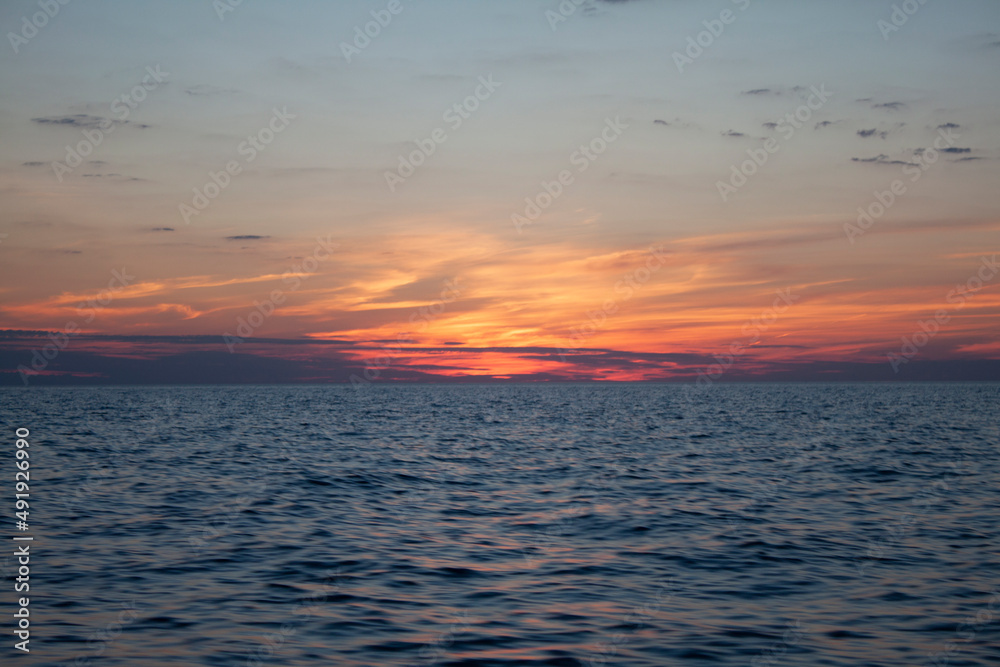 Fototapeta premium sunset over the lake
