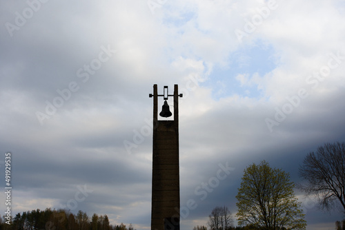 The bells in Khatyn with a sky background. The cemetery of burned vilages. photo